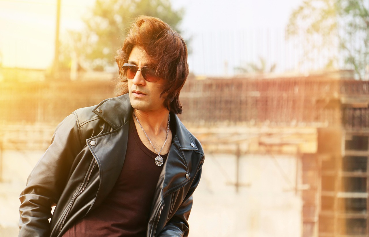 man model, sunglasses, male fashion, attractive youth, blonde and beautiful, action attitude, elegant long hairstyles, street style, macho, desirable hot, commercial perfume concept, hot sexy indian man, long haired guy, isolated town, men wearing leather jacket, cool life, powerful gaze, stylish, charming, urban men fashion, action style, glamorous, men in sunshine, leather blazer, sunlight leak