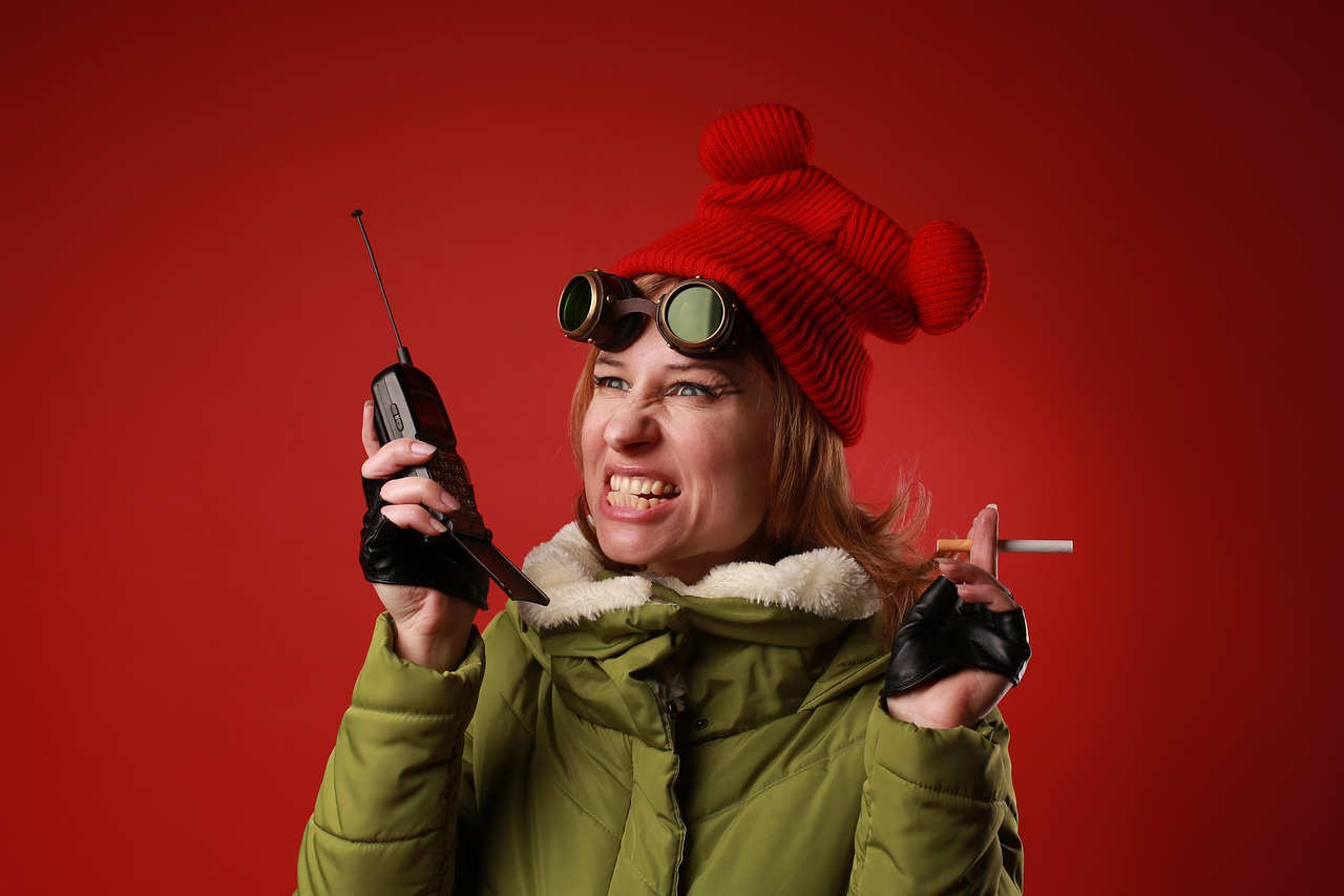 woman, walkie-talkie, cigarette, call, girl, adventurer, traveler, handheld transceiver, two-way radio, emotions, expression, madness, mad, angry, scream, funny, portrait