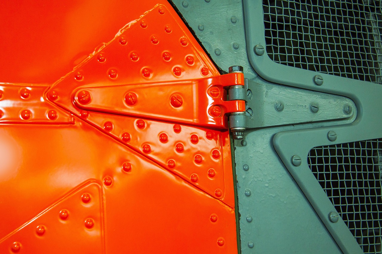 signal color, helicopter door, rivet, screws, door hinge, painted, metal, graphically