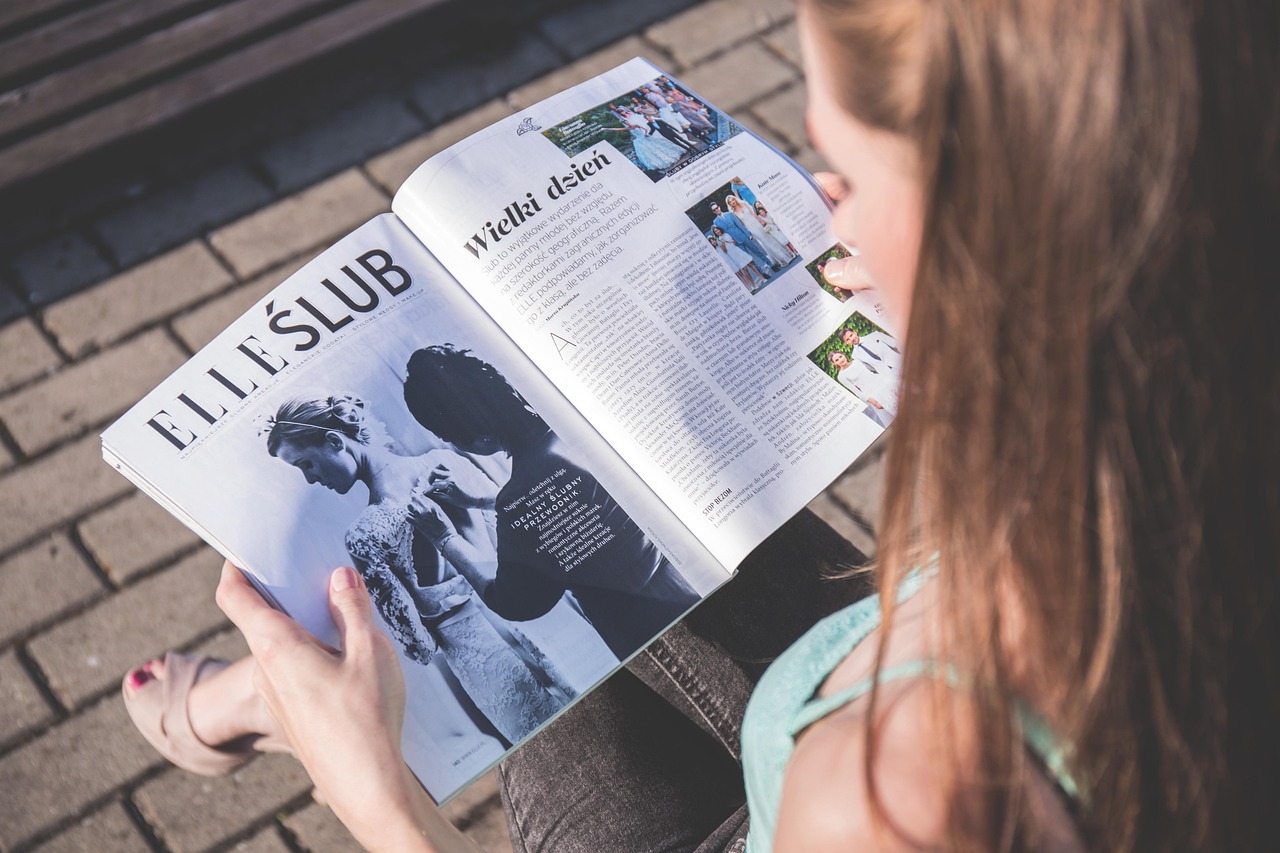 people, adult, attractive, elle, enjoy, female, girl, hair, holding, lady, lifestyle, long, magazine, media, modern, newspaper, person