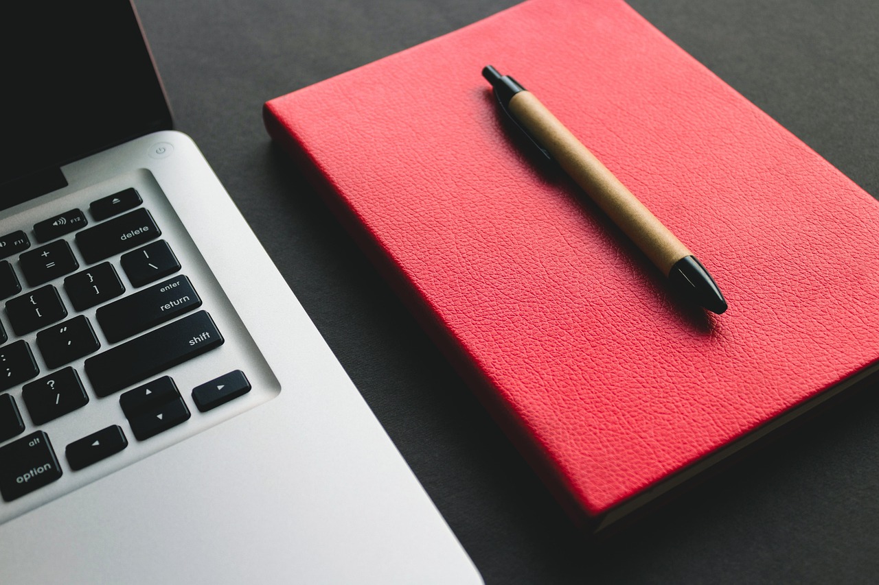 desk, laptop, computer, macbook, keyboard, macbook pro, tech, technology, apple, electronics, minimal, digital, computer hardware, computer keyboard, minimal tech, business, work, office, desk accessory, pen, notebook, notepad, diary, stationery