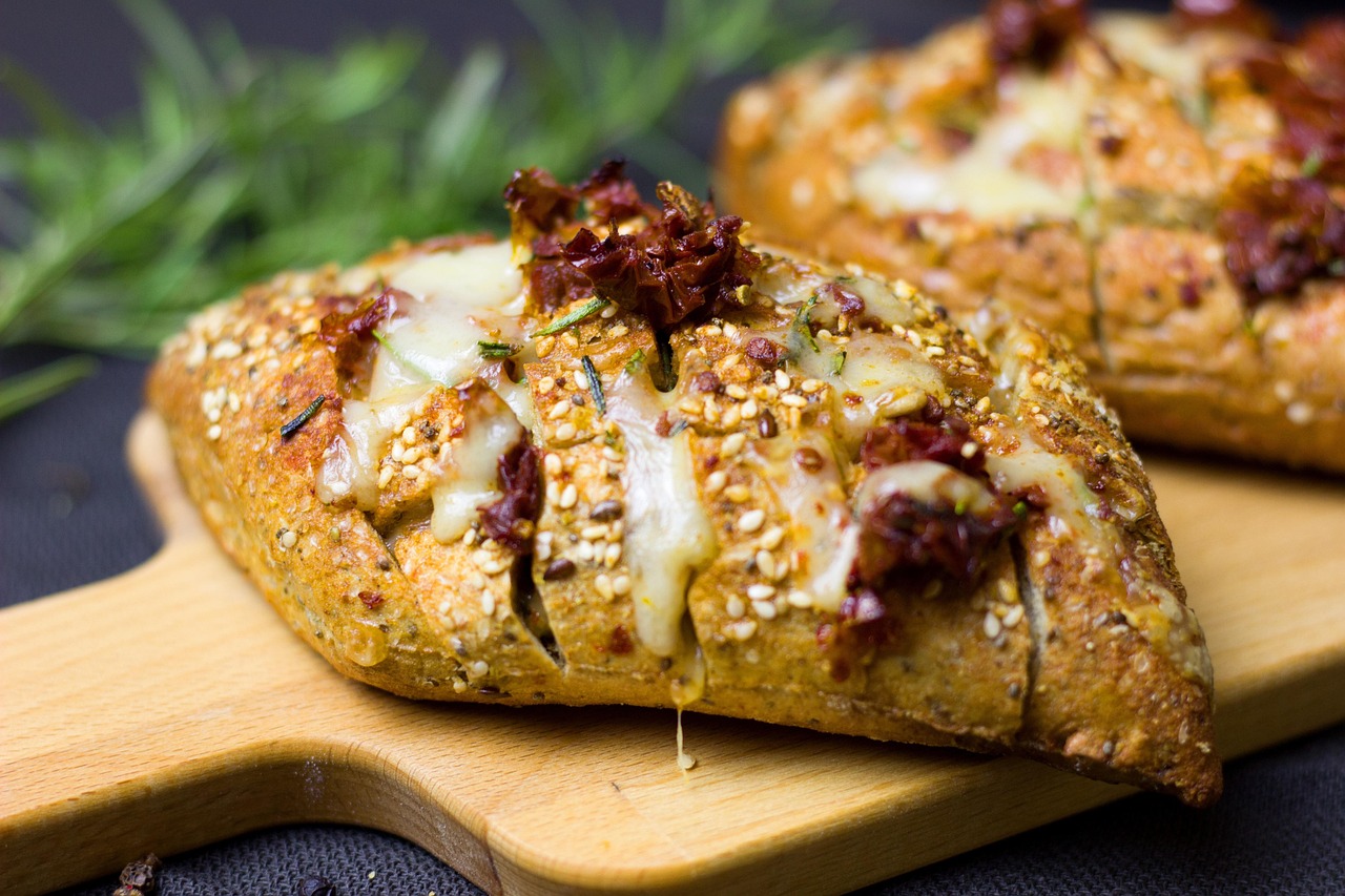 loaf, cheese, tomatoes, baked herbs, rosemary, bun, piquant, yummy, enjoyment, snack, meal, food, nourishment, calories, baguette, starter, to bake, brunch, finger food, dish