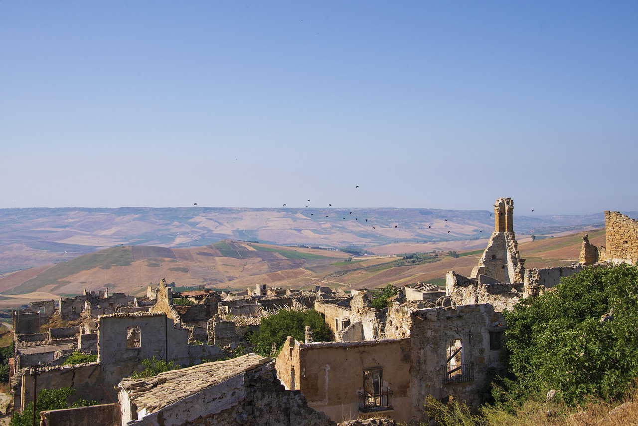 ruins, abandoned, destruction, earthquake, landscape, village, birds, flock of birds, crows, blue village