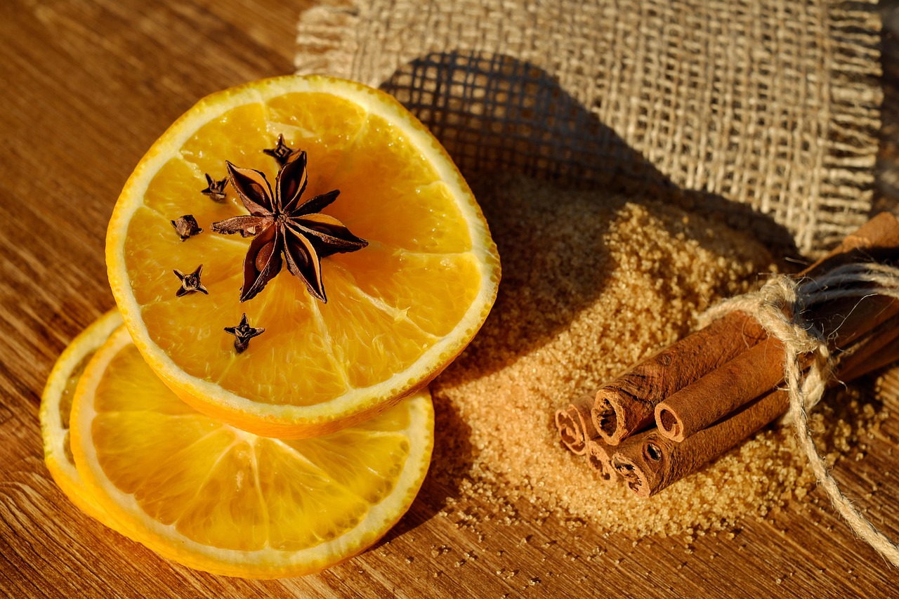 anise, orange slices, cinnamon sticks, aromatics, flavorings, ingredients, spices, star anise, seeds, cinnamon, cloves, dried, dried spices, smell, aroma, mulled claret, brown sugar, food, schisandraceae
