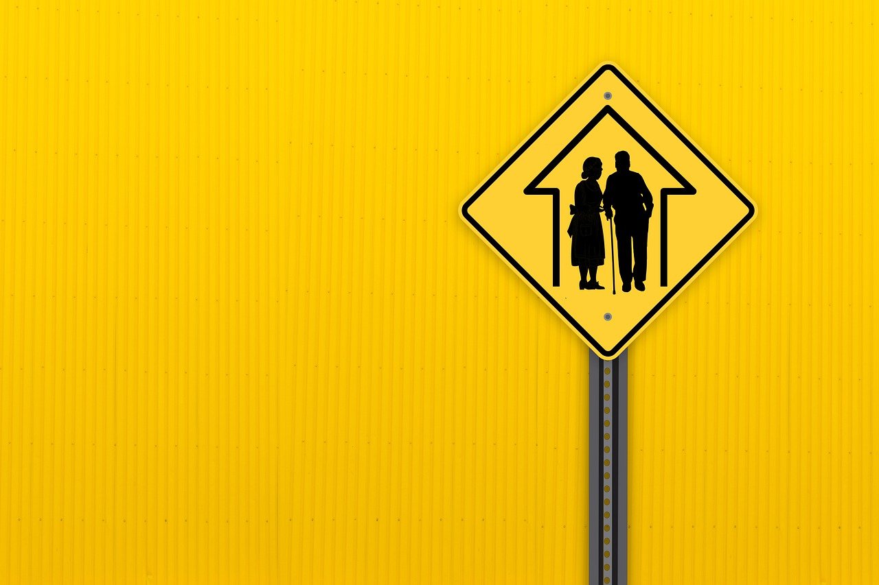 road sign, seniors, retirement, yellow, background, copy space, street sign, aged, elderly, protection, care, help, nursing home, retirement home