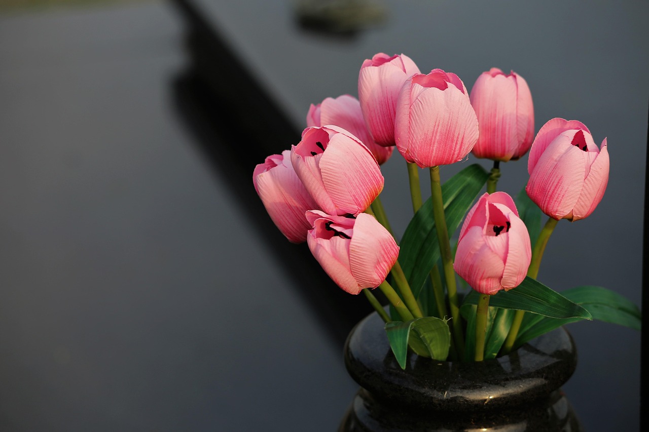 artificial flowers, vase, colorful, decoration, black marble, gravestone, outdoor