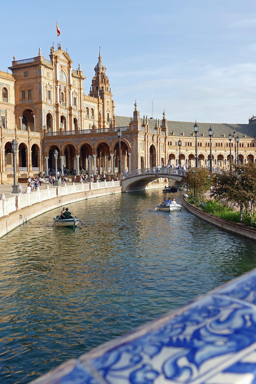 building, architecture, plaza de españa, seville, spain, water, boat, attraction, tourism, history, bridge