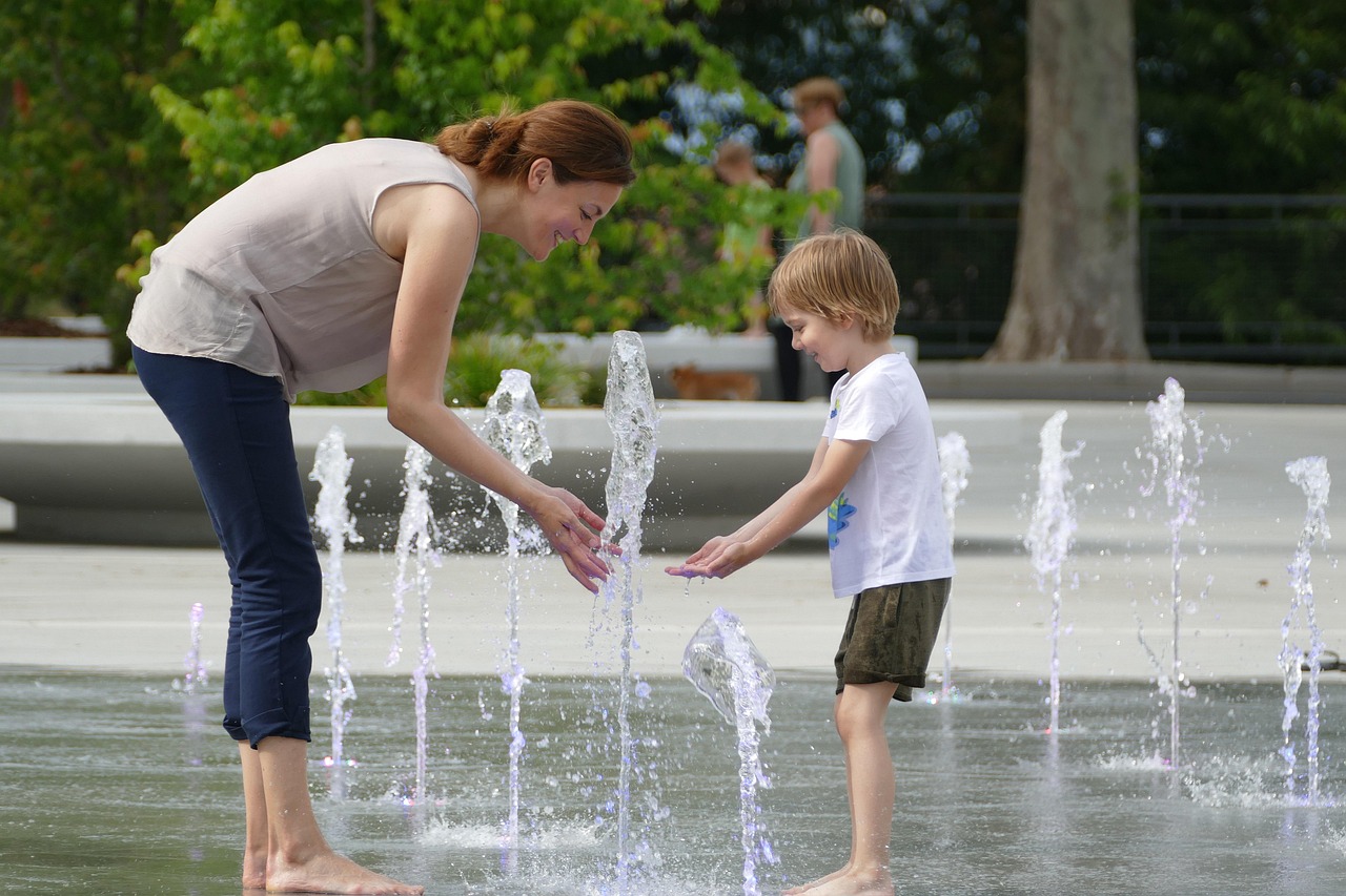 woman, boy, fountain, park, mother, son, child, game, water, mothers day, mother's day, mom, mum, play