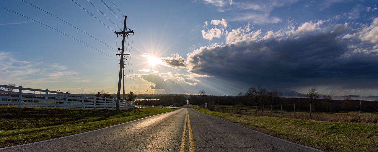 road to the sun, sunset, driving into the sunset, highway, lonely highway, road, sky, sun, clouds, stormfront, storm, storm front, evening, dusk, ligh, sunlight, scenic, missouri, longview farm, lee's summit, blue storm, blue lonely
