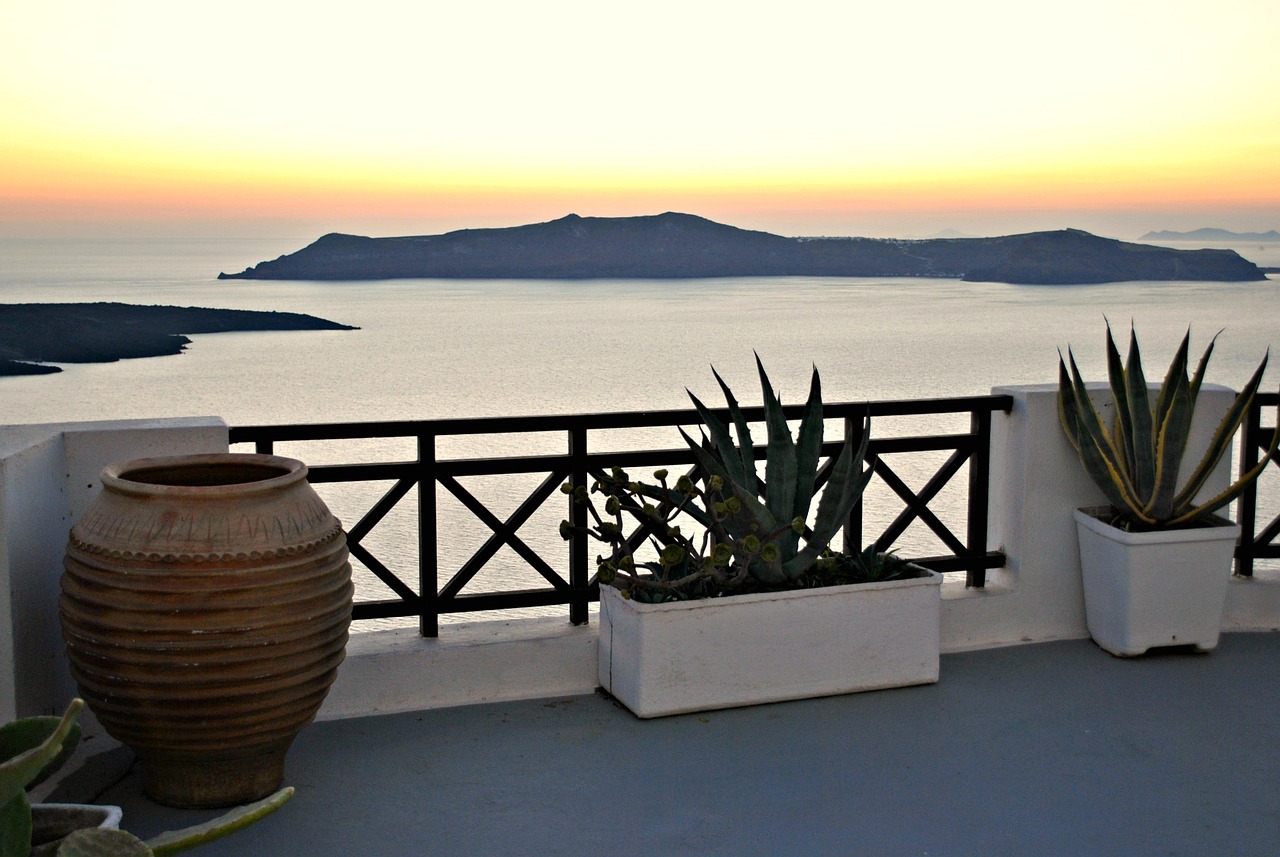 sunset, santorini, holidays, greece, island, landscape, travel, greek, sea, sky, tourism, cyclades, europe, aegean, architecture, blue, oia, summer, village, white, town, building, caldera, romantic, city, house, church, scenery, landmark, mediterranean, vacation, thira, evening, cliff, traditional, european, sun