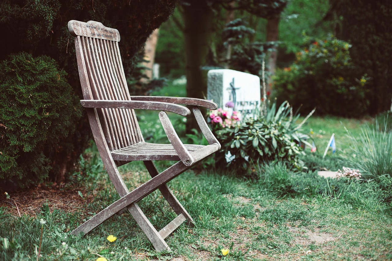 dig, chair, resting place, graveyard, silence, abandoned, morbid, lonliness, memory, transience, grief